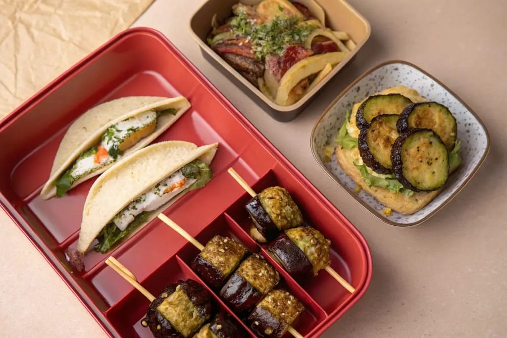  A showcase of how pickled Japanese eggplant can be integrated into various meals—bento, skewers, and even tacos.